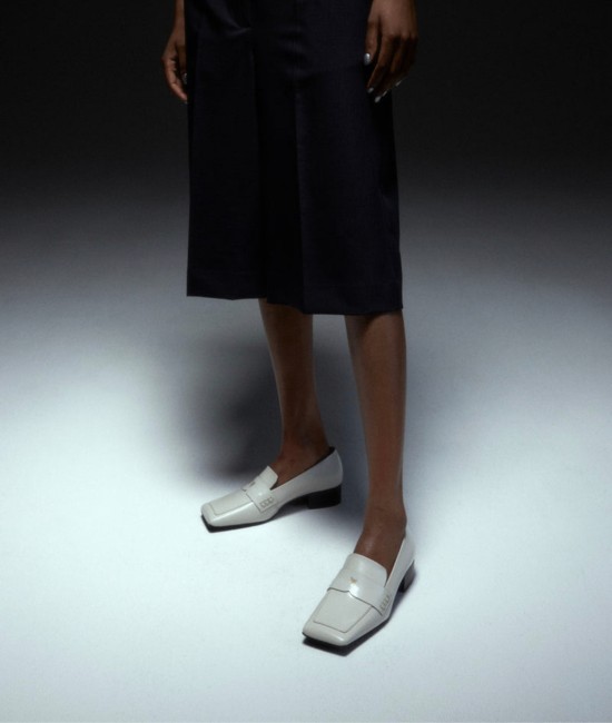 Heeled loafers in a light shade Heeled loafers in a light shade
